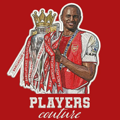 Patrick Vieirai Badge Men's Hoodie – red close-up detail shot of the Patrick Vieira Players Couture logo design