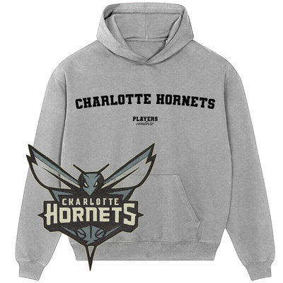 Grey Players Couture hoodie with Charlotte Hornets text and team logo, premium sports fanwear