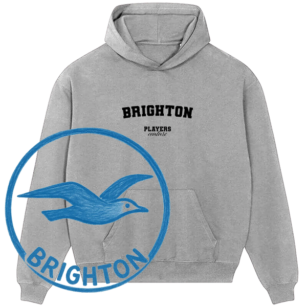 Grey Brighton Players Couture hoodie with blue bird Brighton logo, premium sports fashion.