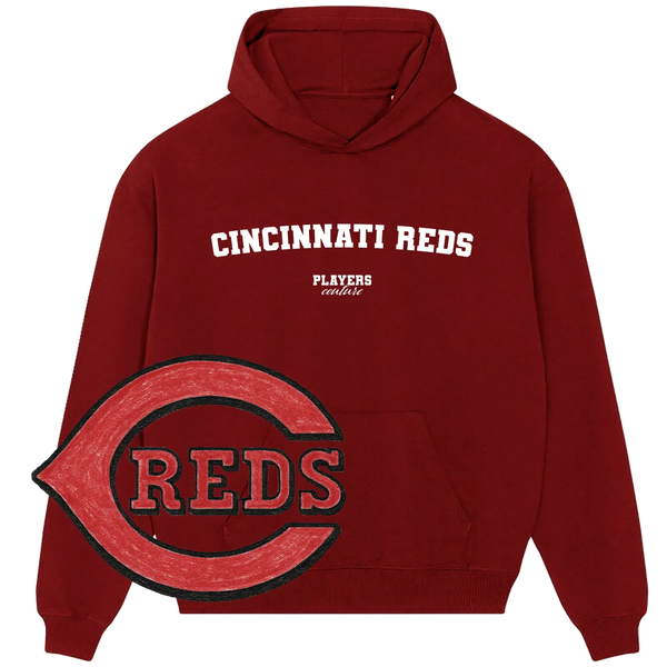 Cincinnati Reds maroon hoodie by Players Couture, featuring team logo and bold white text.