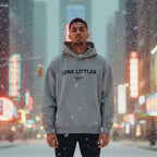 Luke Littler hoodie – close-up of white Luke Littler lettering and Players Couture logo on the chest