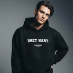 Bret Hart hoodie – navy men's hoodie with white Bret Hart letters and Players Couture logo on the chest