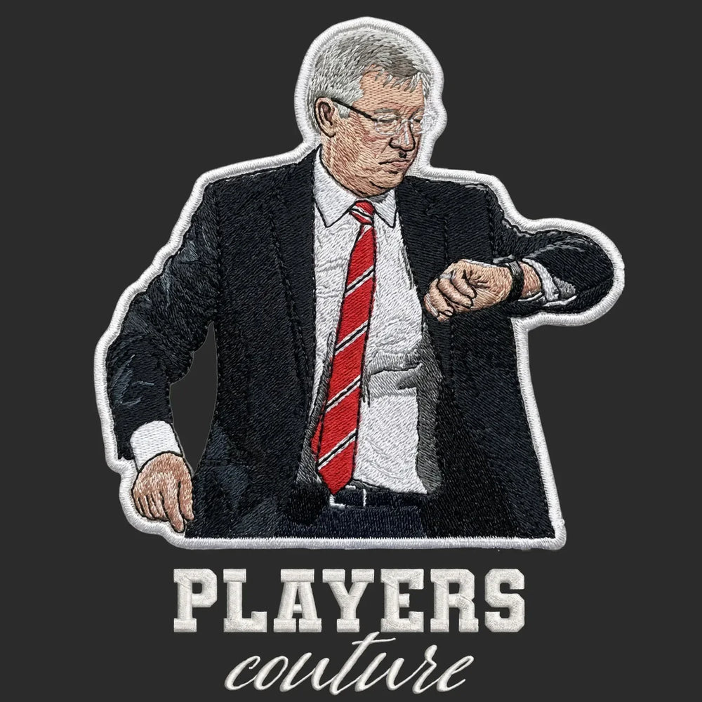 Alex Ferguson Badge Men's T-Shirt – black close-up detail shot of the Alex Ferguson Players Couture logo design