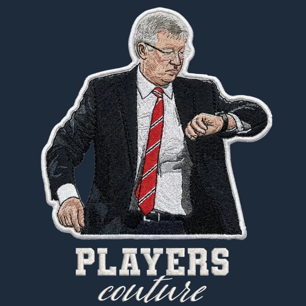 Alex Ferguson Badge Men's Hoodie – close-up detail shot of the Alex Ferguson Players Couture logo design