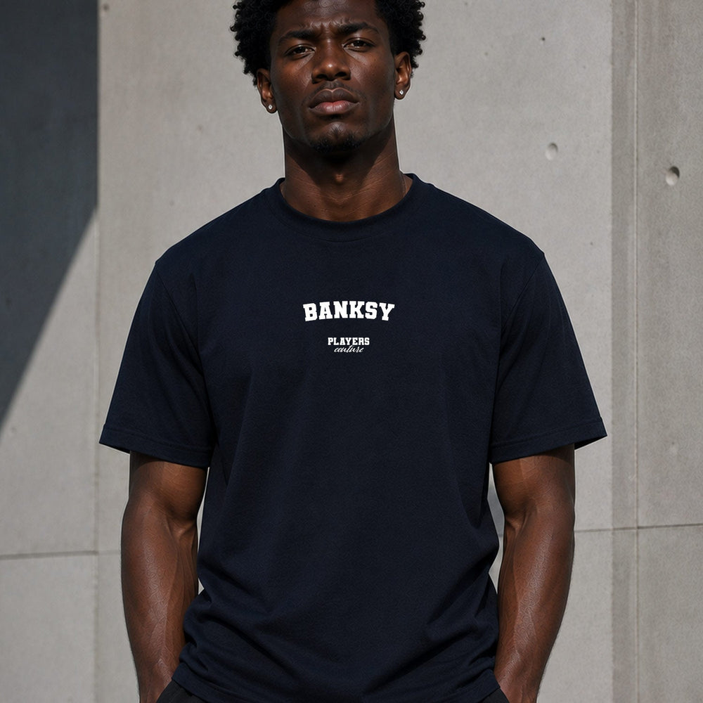 Banksy Men's T-Shirt — lifestyle photo, Navy t-shirt