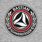 Bastian Schweinsteiger Logo Men's T-Shirt – grey close-up detail shot of the Bastian Schweinsteiger Players Couture logo