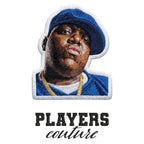 Biggie Smalls Blue Hat Badge Men's Hoodie – black close-up detail shot of the Biggie Smalls Blue Players Couture logo design