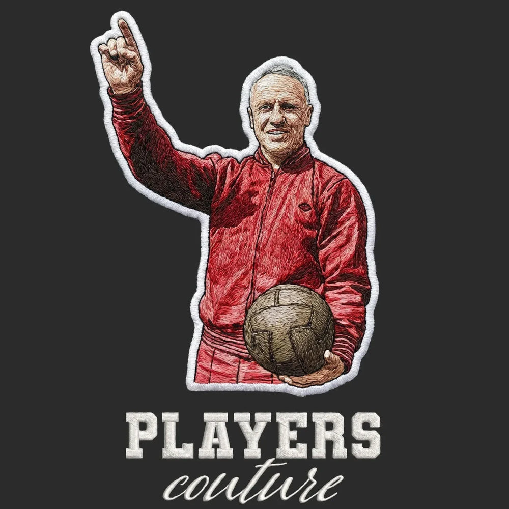 Bill Shankly Tracksuit Badge Men's T-Shirt – black close-up detail shot of the Bill Shankly Tracksuit Players Couture logo