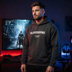 Bloodborne hoodie – close-up of white Bloodborne lettering and Players Couture logo on the chest