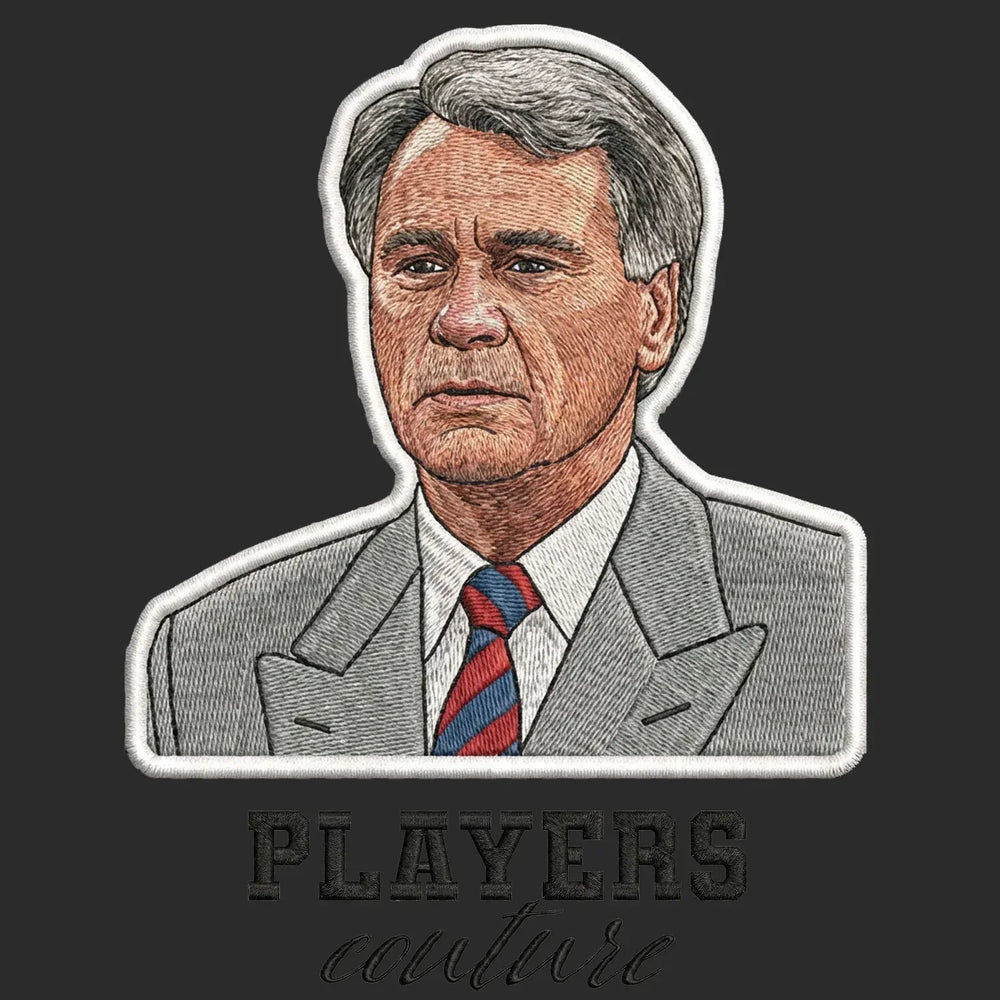Bobby Robson Badge Men's T-Shirt – black close-up detail shot of the Bobby Robson Players Couture logo design
