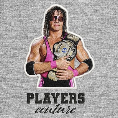 Bret Hart Badge Men's Hoodie – black close-up detail shot of the Bret Hart Players Couture logo design