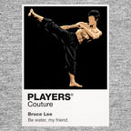 Bruce Lee Bruce Lee's fighting stance, controlled speed and yellow-black action-cinema silhouette Icon Frame artwork in grey