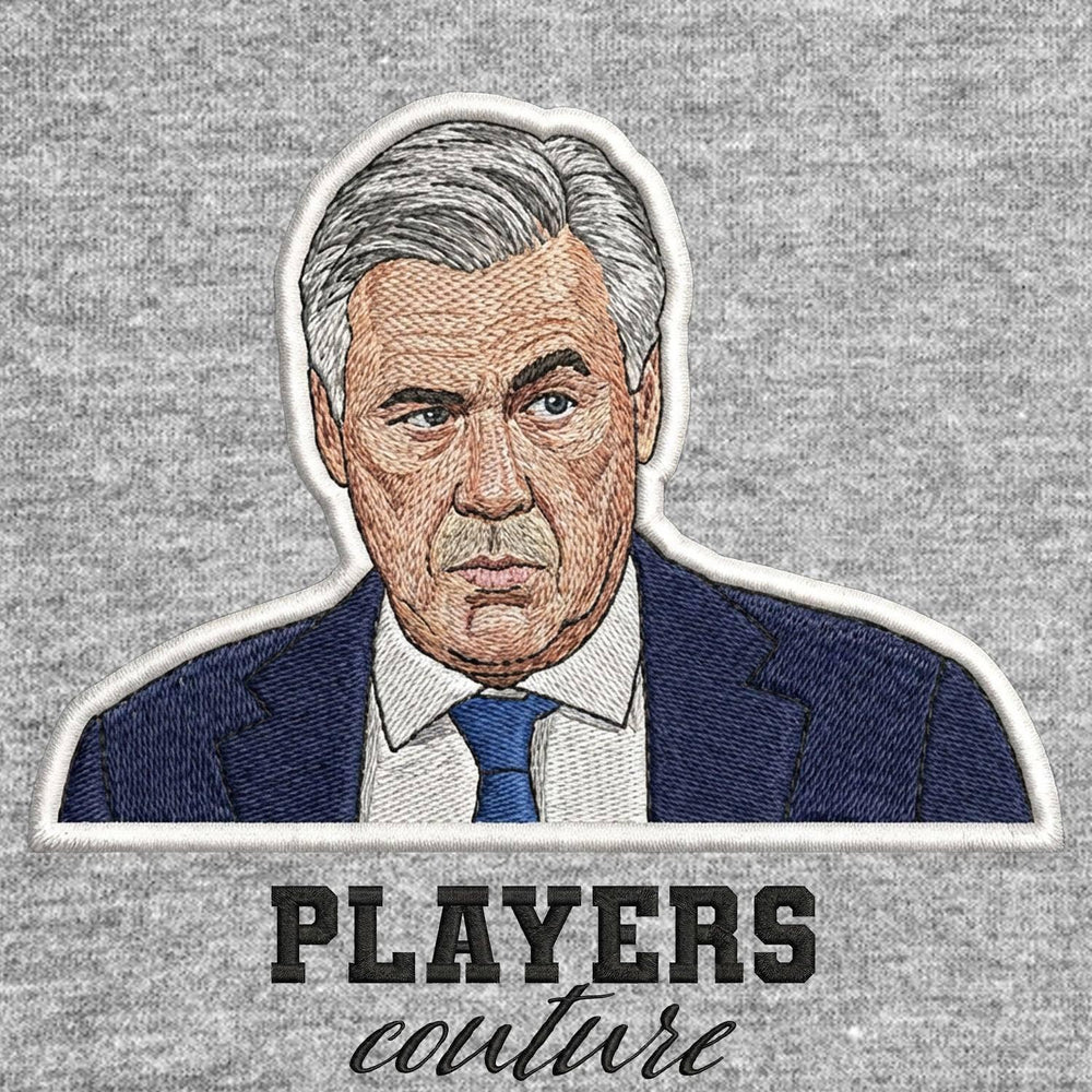 Carlo Ancelotti Badge Men's T-Shirt – grey close-up detail shot of the Carlo Ancelotti Players Couture logo design