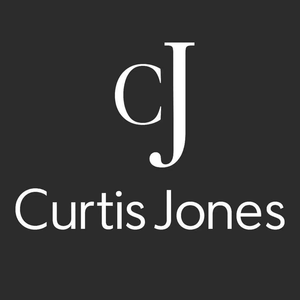 Curtis Jones Logo Kids Hoodie – black close-up detail shot of the Curtis Jones Players Couture logo design