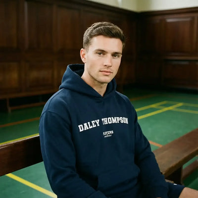 Daley Thompson hoodie – navy men's hoodie with white Daley Thompson letters and Players Couture logo on the chest