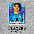 Darwin Nunez World Cup Sticker Men's T-Shirt – grey close-up detail shot of the Darwin Nunez World Cup Players Couture logo