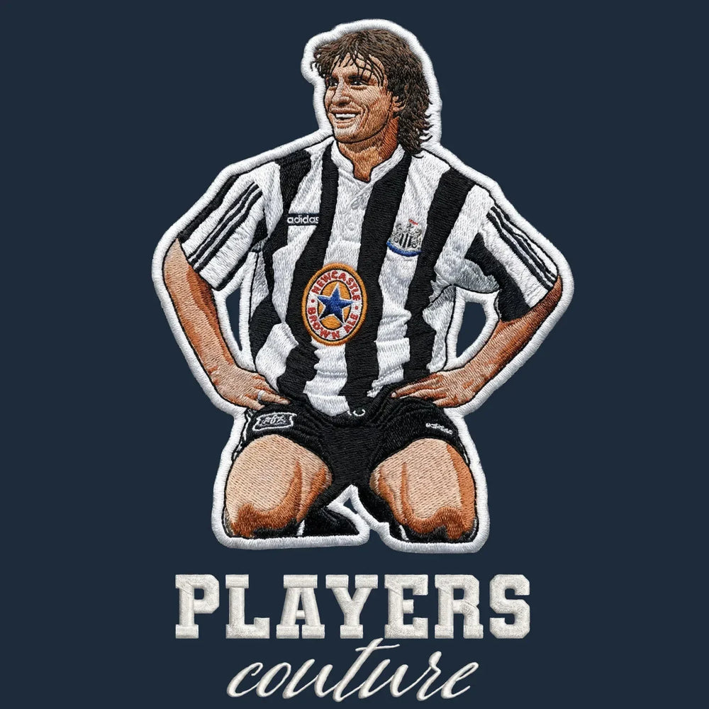 David Ginola Newcastle Badge Men's Hoodie – close-up detail shot of the David Ginola Newcastle Players Couture logo design