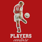 Dennis Bergkamp Badge Men's T-Shirt – red close-up detail shot of the Dennis Bergkamp Players Couture logo design