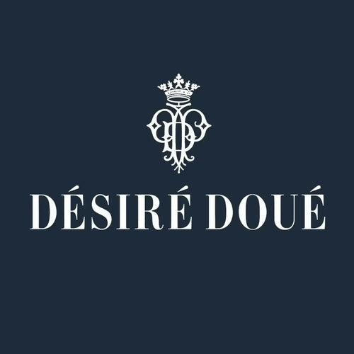 Desire Doue Logo Men's Hoodie – navy close-up detail shot of the Desire Doue Players Couture logo design