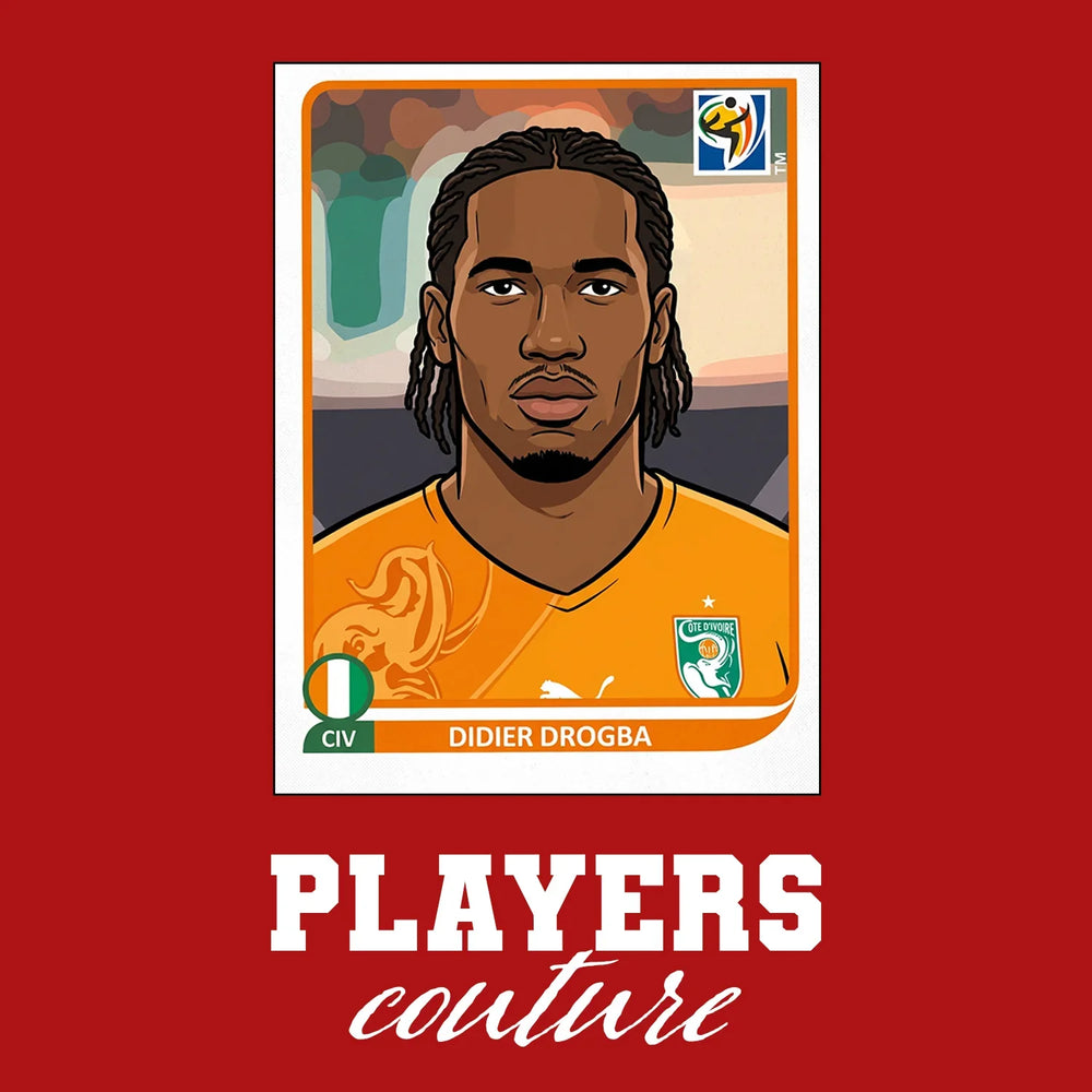Didier Drogba World Cup Sticker Men's T-Shirt – red close-up detail shot of the Didier Drogba World Cup Players Couture logo