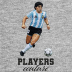 Diego Maradona Dribble Badge Men's Hoodie – grey close-up detail shot of the Diego Maradona Players Couture logo design