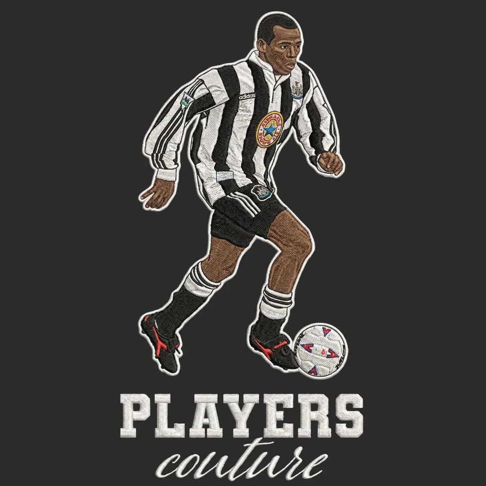 Faustino Asprilla Badge Men's T-Shirt – black close-up detail shot of the Faustino Asprilla Players Couture logo design