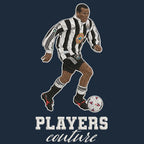 Faustino Asprilla Badge Men's Hoodie – close-up detail shot of the Faustino Asprilla Players Couture logo design