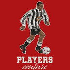 Faustino Asprilla Badge Men's T-Shirt – red close-up detail shot of the Faustino Asprilla Players Couture logo design