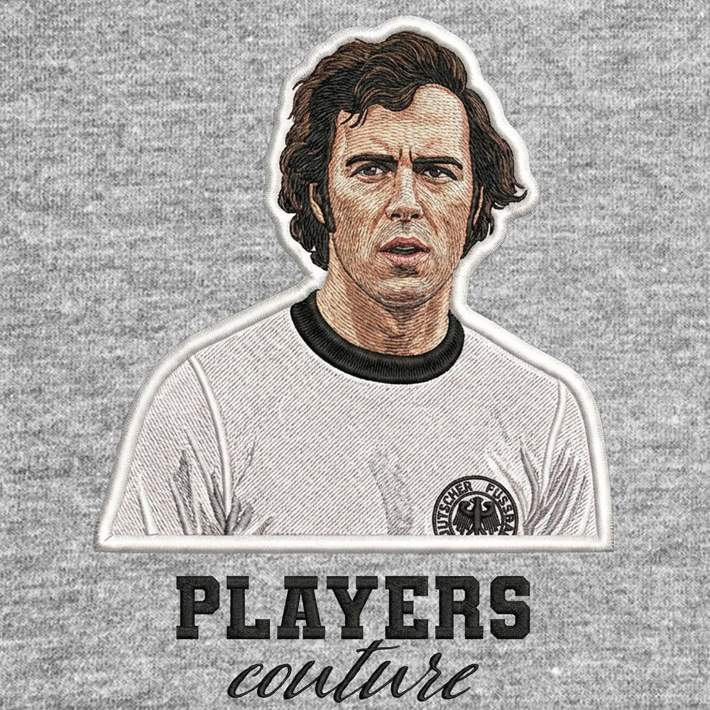 Franz Beckenbauer Badge Men's T-Shirt – grey close-up detail shot of the Franz Beckenbauer Players Couture logo design