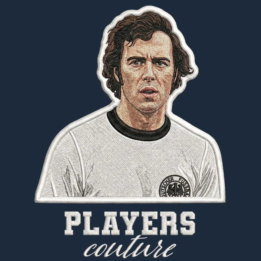Franz Beckenbauer Badge Men's T-Shirt – navy close-up detail shot of the Franz Beckenbauer Players Couture logo design