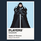 Jon Snow Jon Snow in black Night's Watch cloak carrying Longclaw beneath falling snow Icon Frame artwork in navy