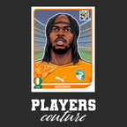 Gervinho World Cup Sticker Men's T-Shirt – black close-up detail shot of the Gervinho World Cup Players Couture logo design