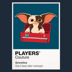 Gremlins Gizmo beside the mischievous Gremlins under Christmas lights in Kingston Falls Icon Frame artwork in navy