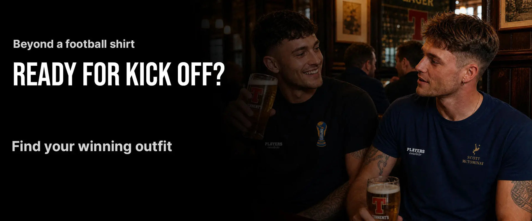 Two men sitting together in a pub, one holding a beer, with promotional text about football shirts.