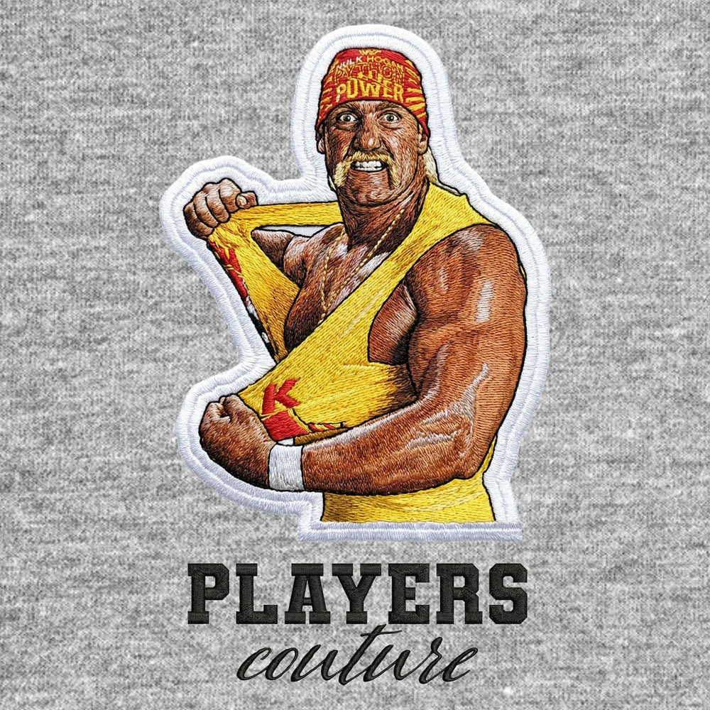 Hulk Hogan Badge Men's Hoodie – black close-up detail shot of the Hulk Hogan Players Couture logo design