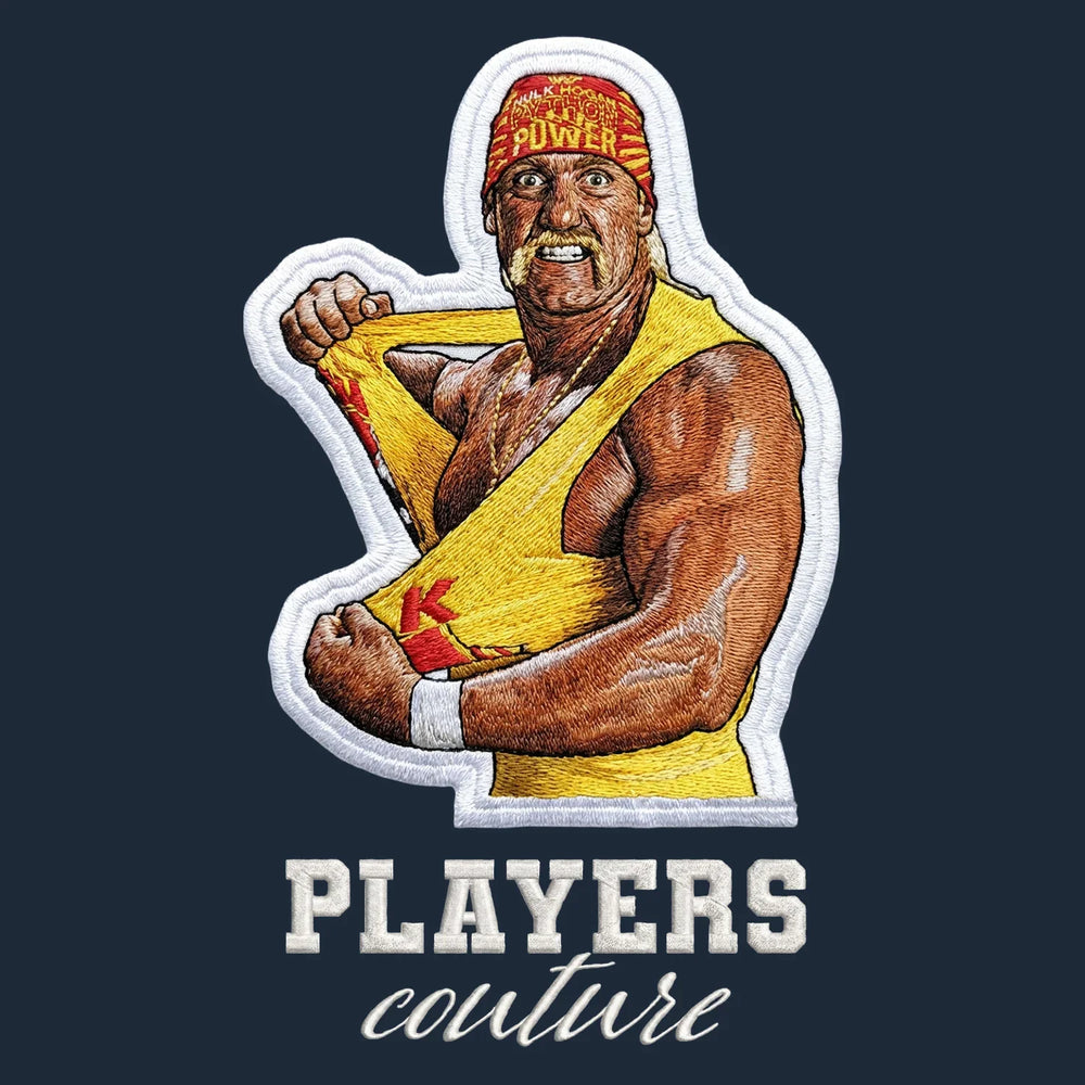 Hulk Hogan Badge Men's Hoodie – white close-up detail shot of the Hulk Hogan Players Couture logo design