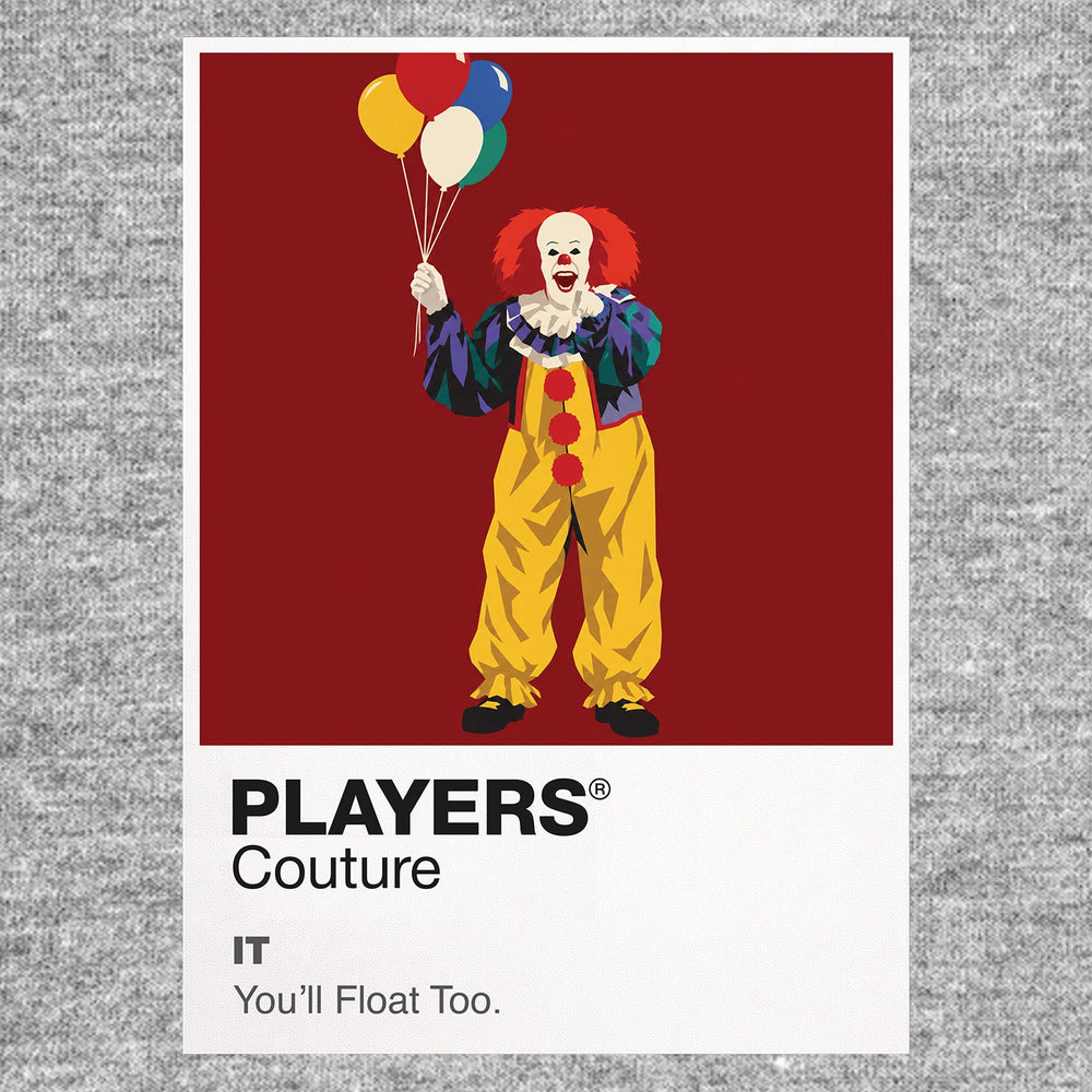 IT 1990 Tim Curry's Pennywise holding a red balloon beneath the streets of Derry Icon Frame artwork in grey