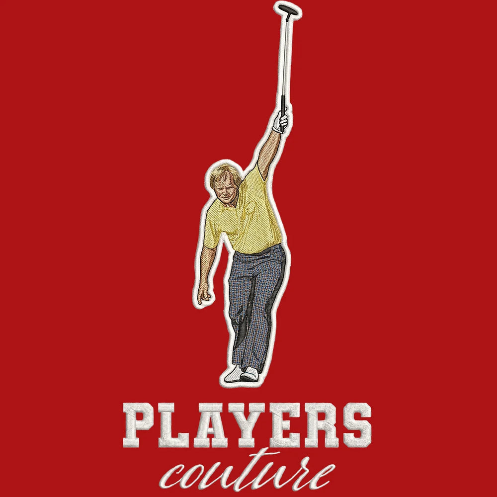 Jack Nicklaus Badge Men's T-Shirt – red close-up detail shot of the Jack Nicklaus Players Couture logo design