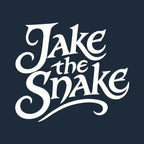 Jake The Snake Roberts Logo Men's Hoodie – navy close-up detail shot of the Jake The Snake Roberts Players Couture logo