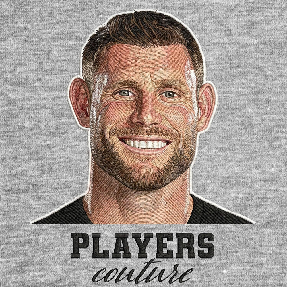James Milner Badge Men's Hoodie – grey close-up detail shot of the James Milner Players Couture logo design