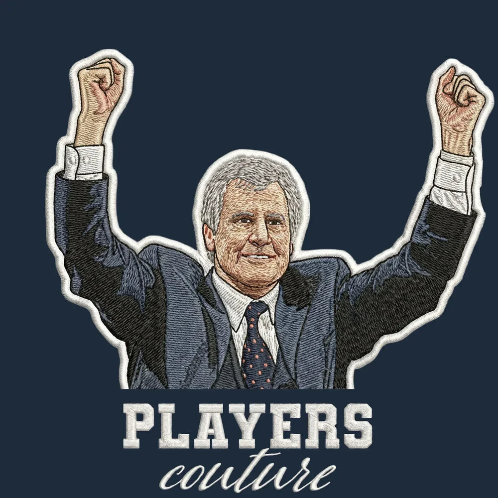 Joe Royle Badge Men's Hoodie – navy close-up detail shot of the Joe Royle Players Couture logo design