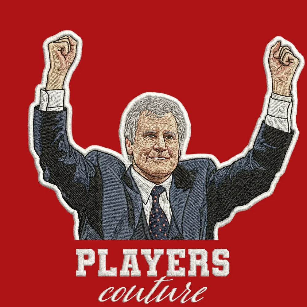 Joe Royle Badge Men's Hoodie – red close-up detail shot of the Joe Royle Players Couture logo design