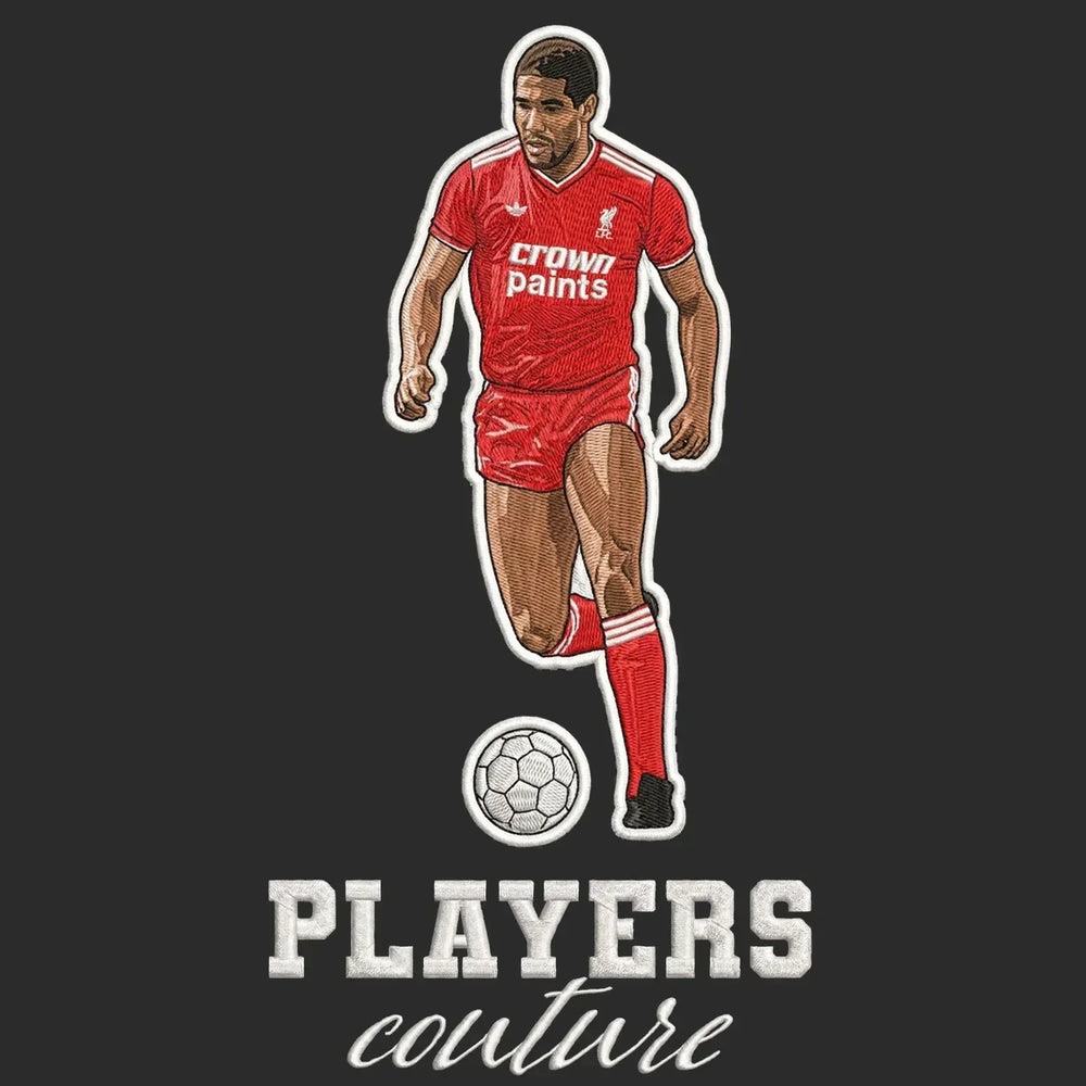 John Barnes Badge Men's Hoodie – black close-up detail shot of the John Barnes Players Couture logo design