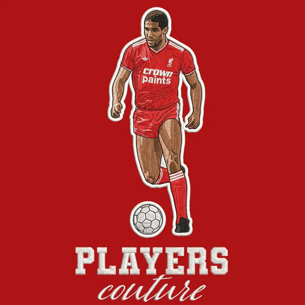 John Barnes Badge Men's Hoodie – red close-up detail shot of the John Barnes Players Couture logo design