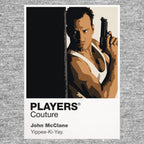 John McClane John McClane in white vest with service pistol and radio inside Nakatomi Plaza Icon Frame artwork in grey