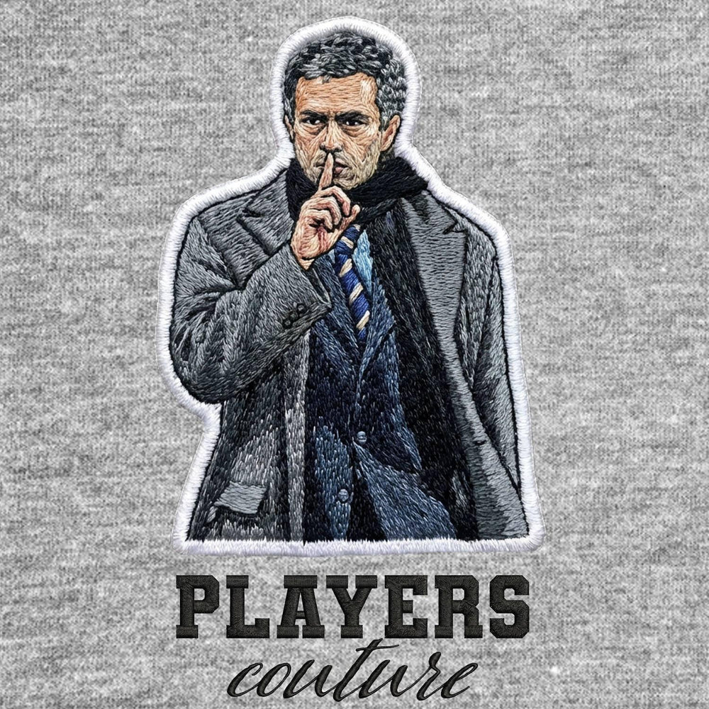 Jose Mourinho Badge Men's Hoodie – grey close-up detail shot of the Jose Mourinho Players Couture logo design