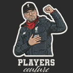 Jurgen Klopp Badge Men's Hoodie – black close-up detail shot of the Jurgen Klopp Players Couture logo design