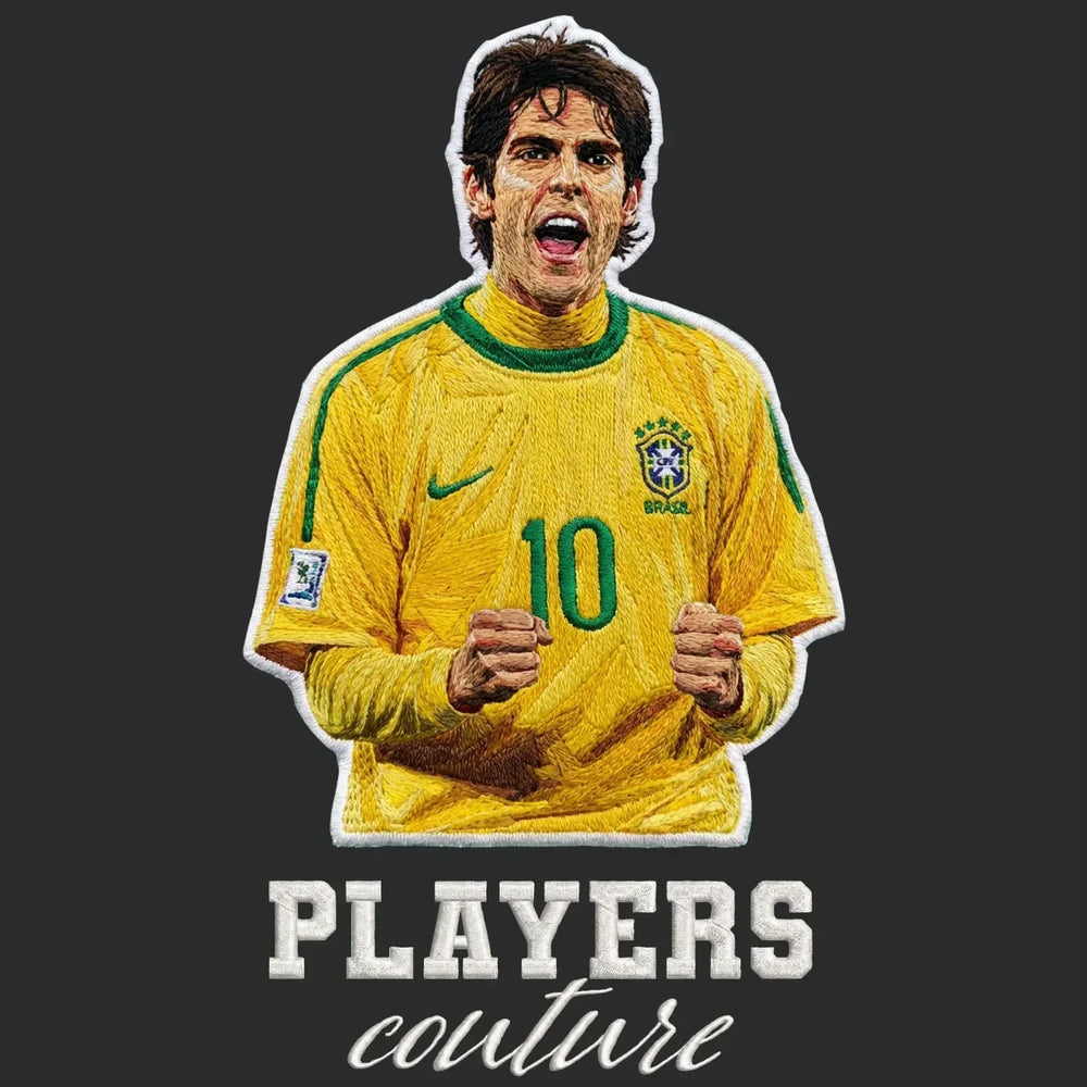 Kaka Badge Men's Hoodie – black close-up detail shot of the Kaka Players Couture logo design