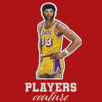 Kareem Abdul Jabbar Badge Men's Hoodie – red close-up detail shot of the Kareem Abdul Jabbar Players Couture logo design