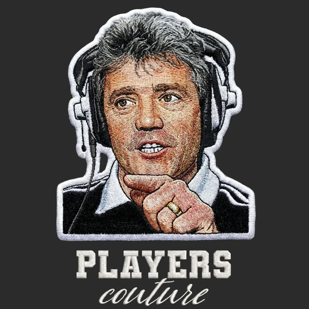 Kevin Keegan Love It Badge Men's Hoodie – black close-up detail shot of the Kevin Keegan Love It Players Couture logo design